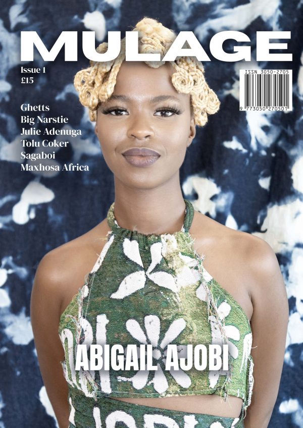 Front Cover of Issue 1 of Mulage Magazine featuring designer Abigail Ajobi in green tie-dye outfit on deep blue tie-dye backdrop.
