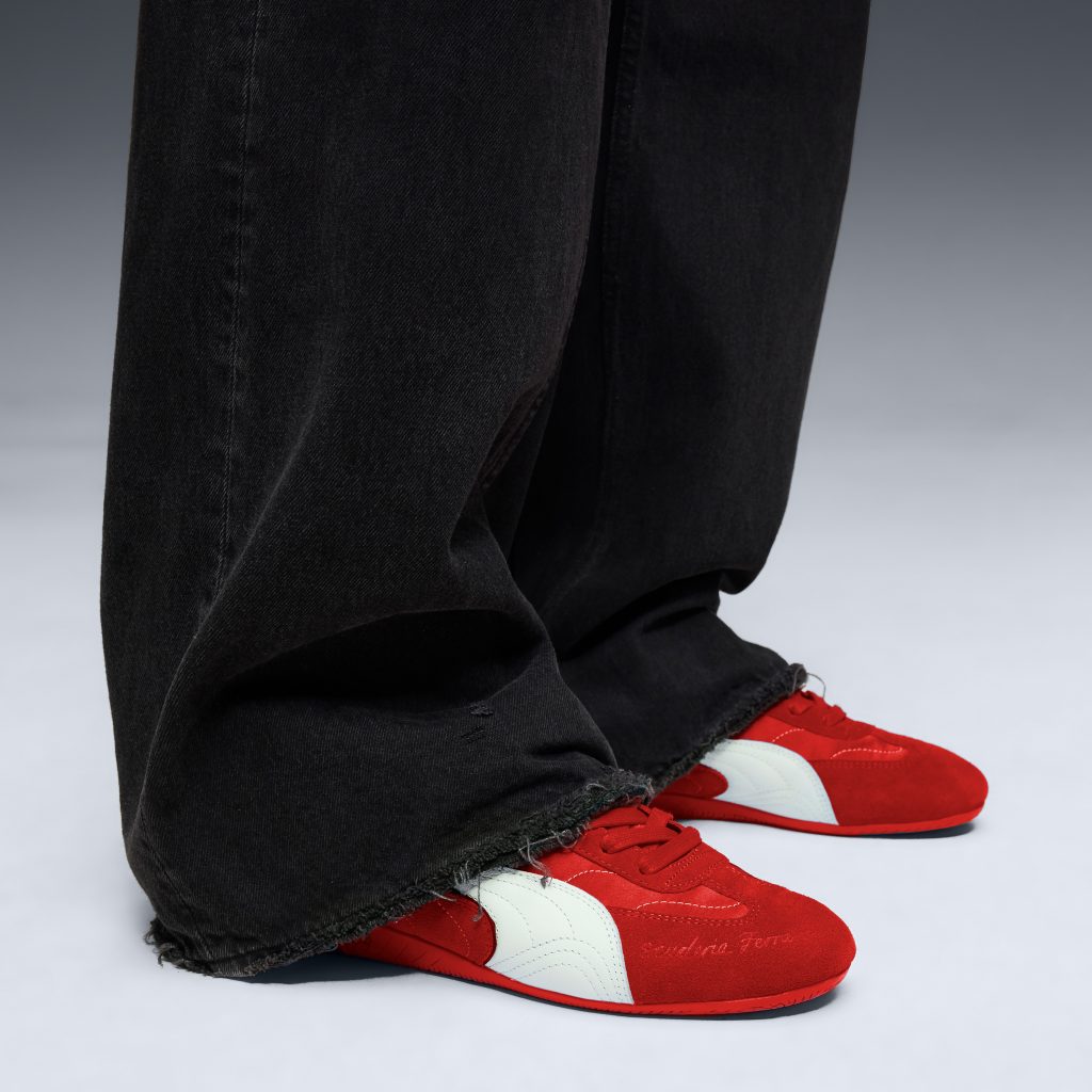 Red trainers with embroidery detail