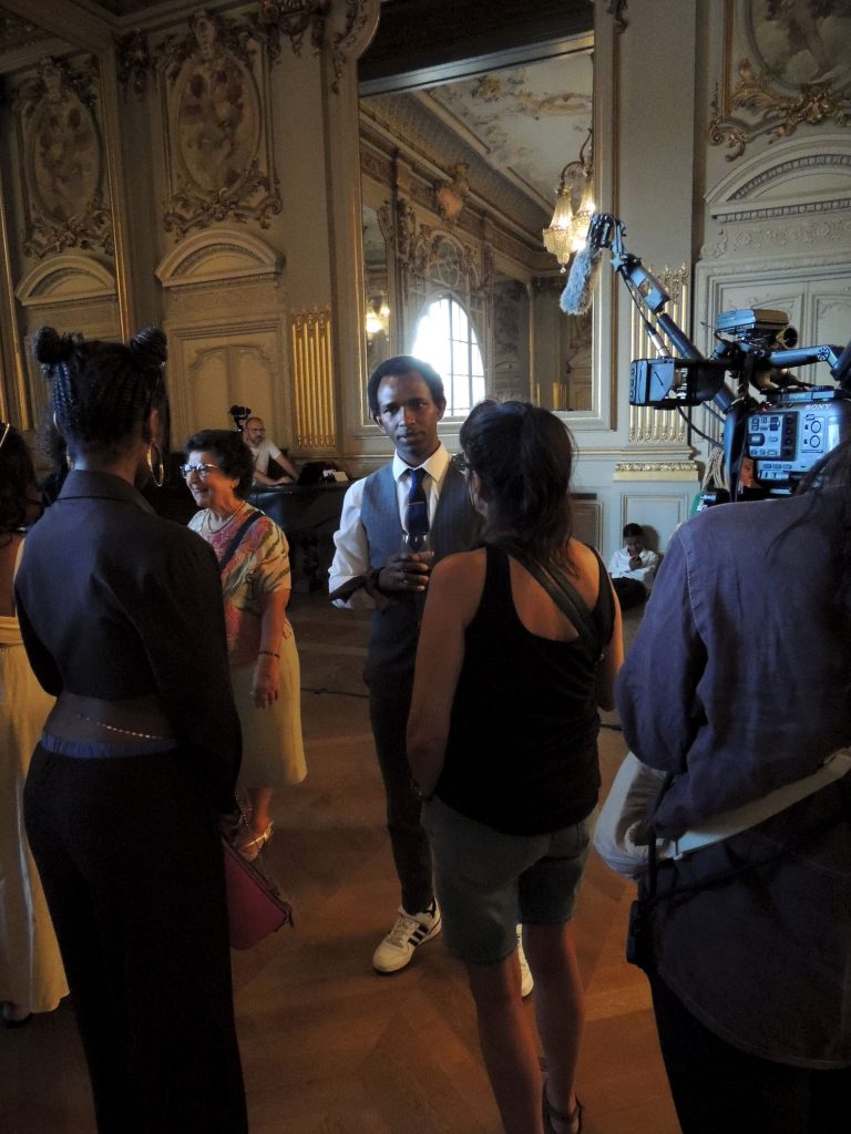 Behind the Scenes photograph of Espero Trainee Ibrahim Barry being filmed for FABRIC documentary